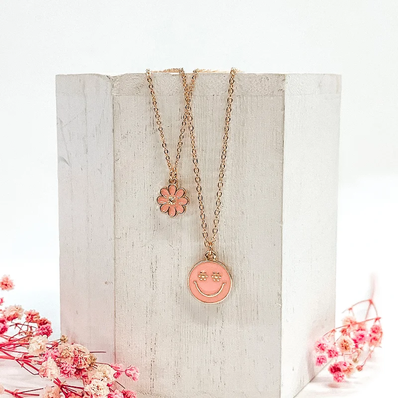 Double Layered Gold Necklace with Flower and Happy Face Pendant in Baby Pink